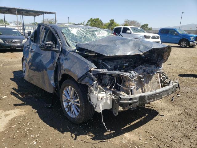 TOYOTA COROLLA L 2014 with VIN 5YFBURHE1EP070573 - Photo from auction