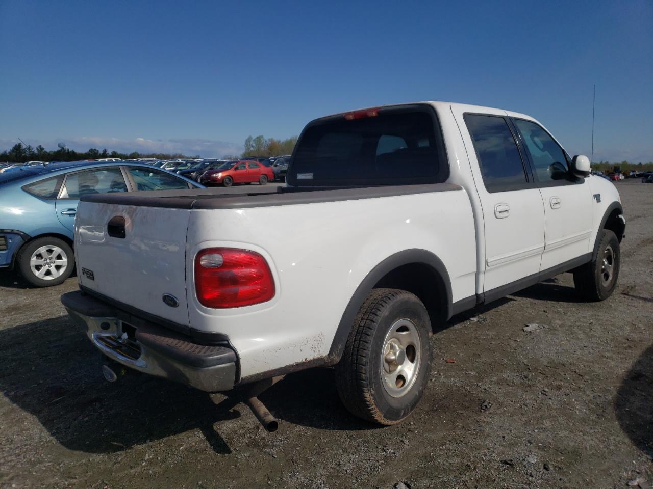 Photo 4 from auction – 2003 FORD F150 SUPER with VIN 1FTRW08L63KD45403