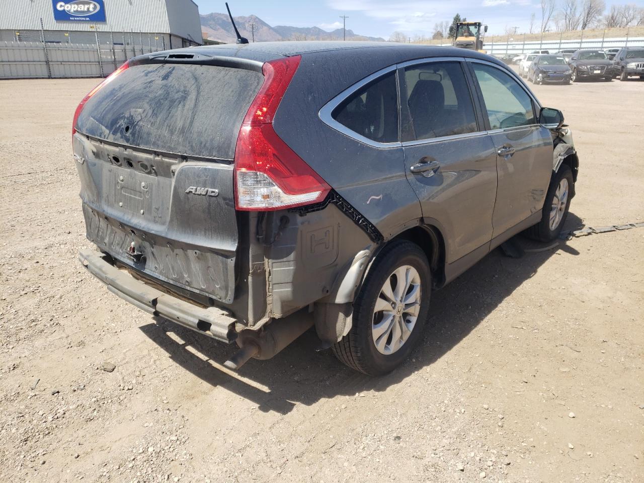 Photo 4 from auction – 2014 HONDA CR-V EX with VIN 5J6RM4H58EL051569