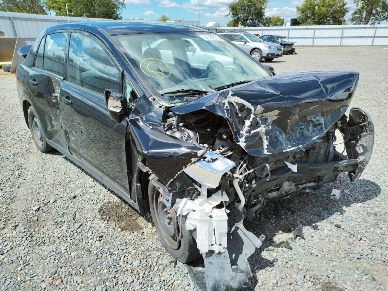 NISSAN VERSA S 2010 with VIN 3N1BC1AP5AL411628 - Photo from auction