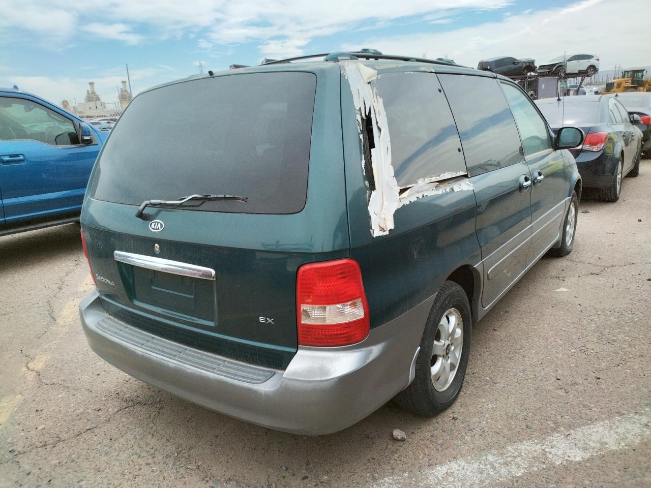 Photo 4 from auction – 2004 KIA SEDONA EX with VIN KNDUP131546595390