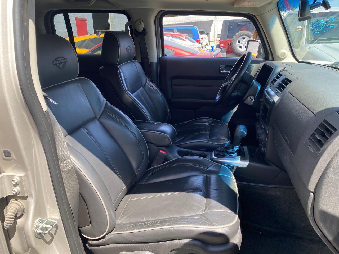 Photo 5 from auction – 2008 HUMMER H3 ALPHA with VIN 5GTEN13L588126458