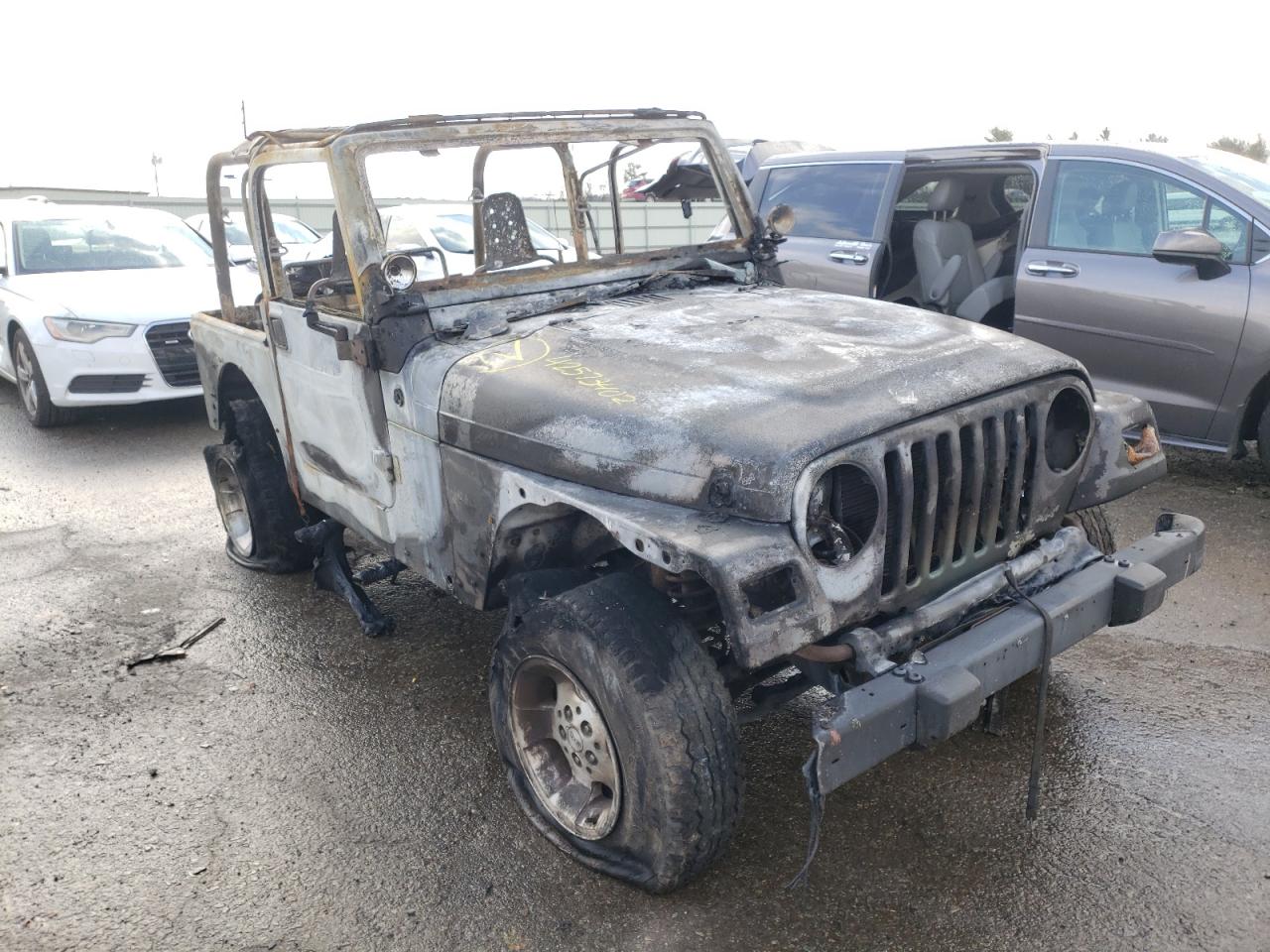 JEEP WRANGLER / 2000 with VIN 1J4FA49S8YP700400 - Photo from auction