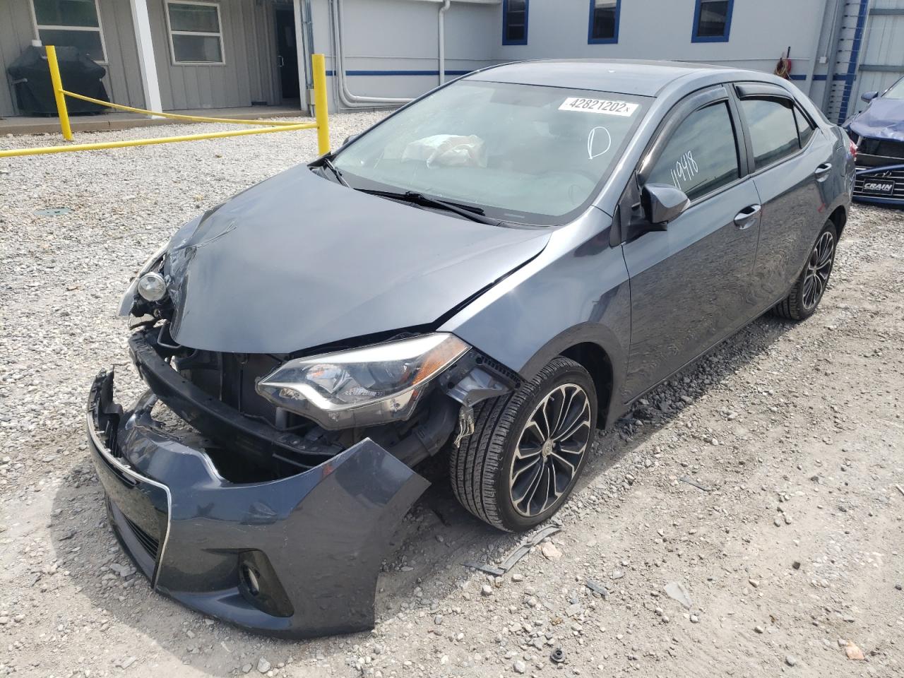 Photo 2 from auction – 2014 TOYOTA COROLLA L with VIN 5YFBURHE6EP035379