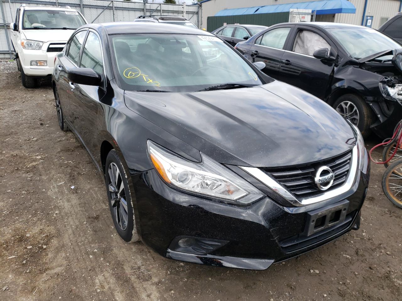 NISSAN ALTIMA 2.5 2018 with VIN 1N4AL3APXJC250232 - Photo from auction