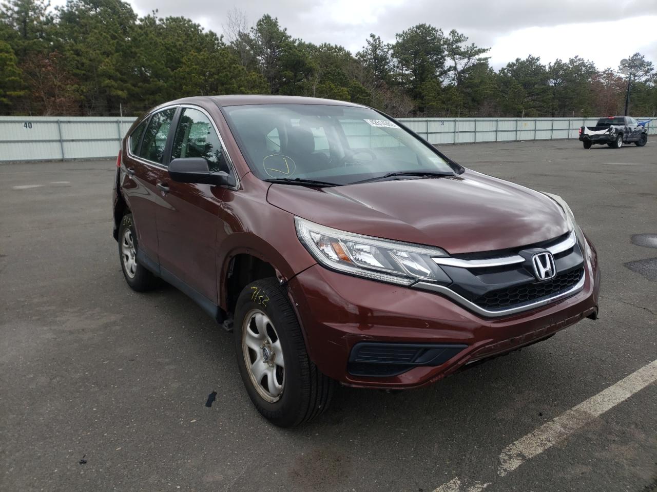Photo 11 from auction – 2015 HONDA CR-V LX with VIN 5J6RM4H31FL018199