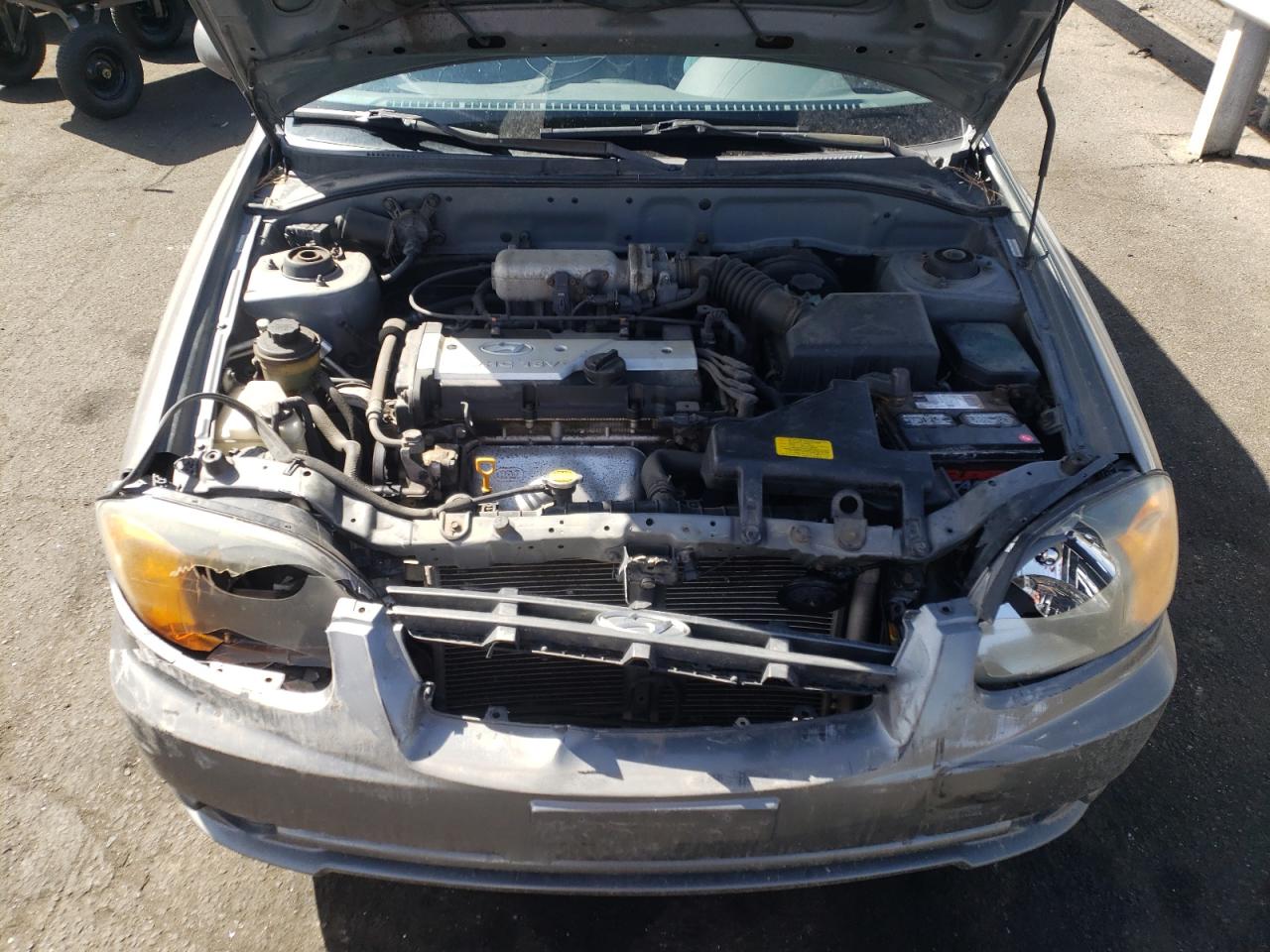 Photo 7 from auction – 2004 HYUNDAI ACCENT GL with VIN KMHCG35C54U319496