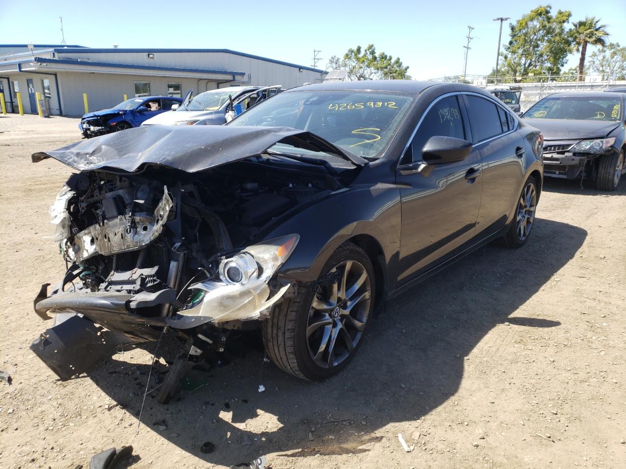 Photo 2 from auction – 2014 MAZDA 6 with VIN JM1GJ1W5XE1101892