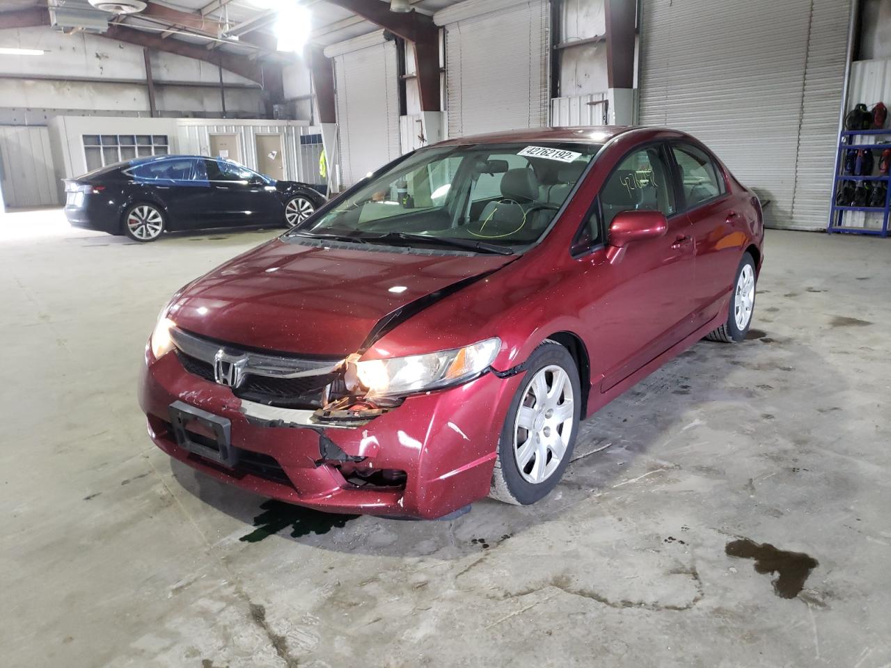Photo 2 from auction – 2011 HONDA CIVIC LX with VIN 2HGFA1F57BH550389