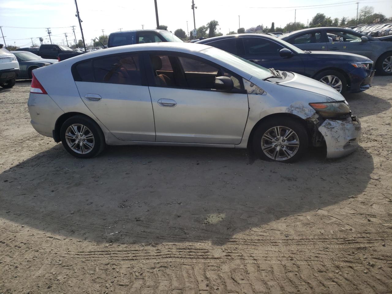 Photo 9 from auction – 2010 HONDA INSIGHT EX with VIN JHMZE2H70AS030805