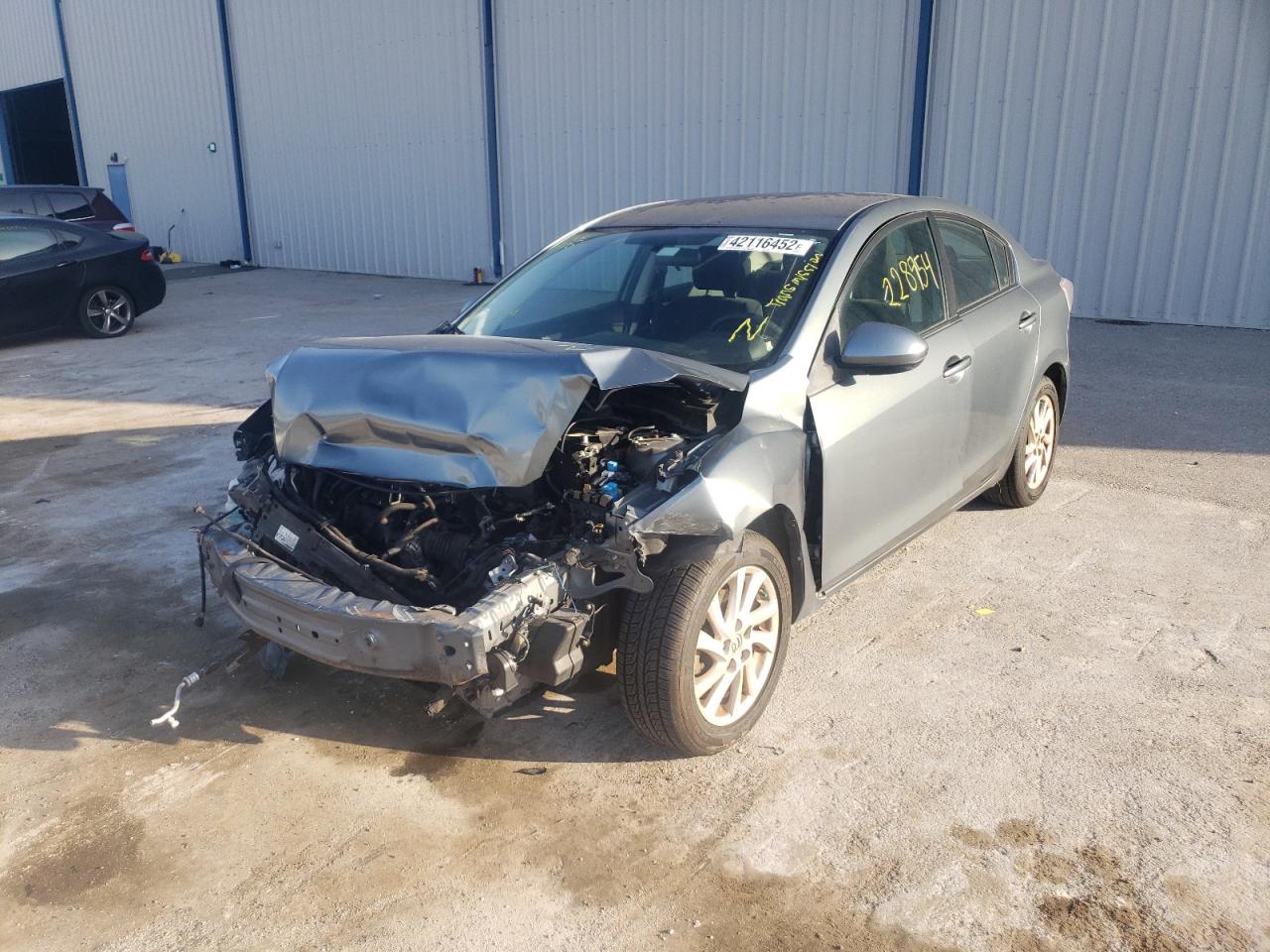Photo 2 from auction – 2012 MAZDA 3 I with VIN JM1BL1V75C1561563