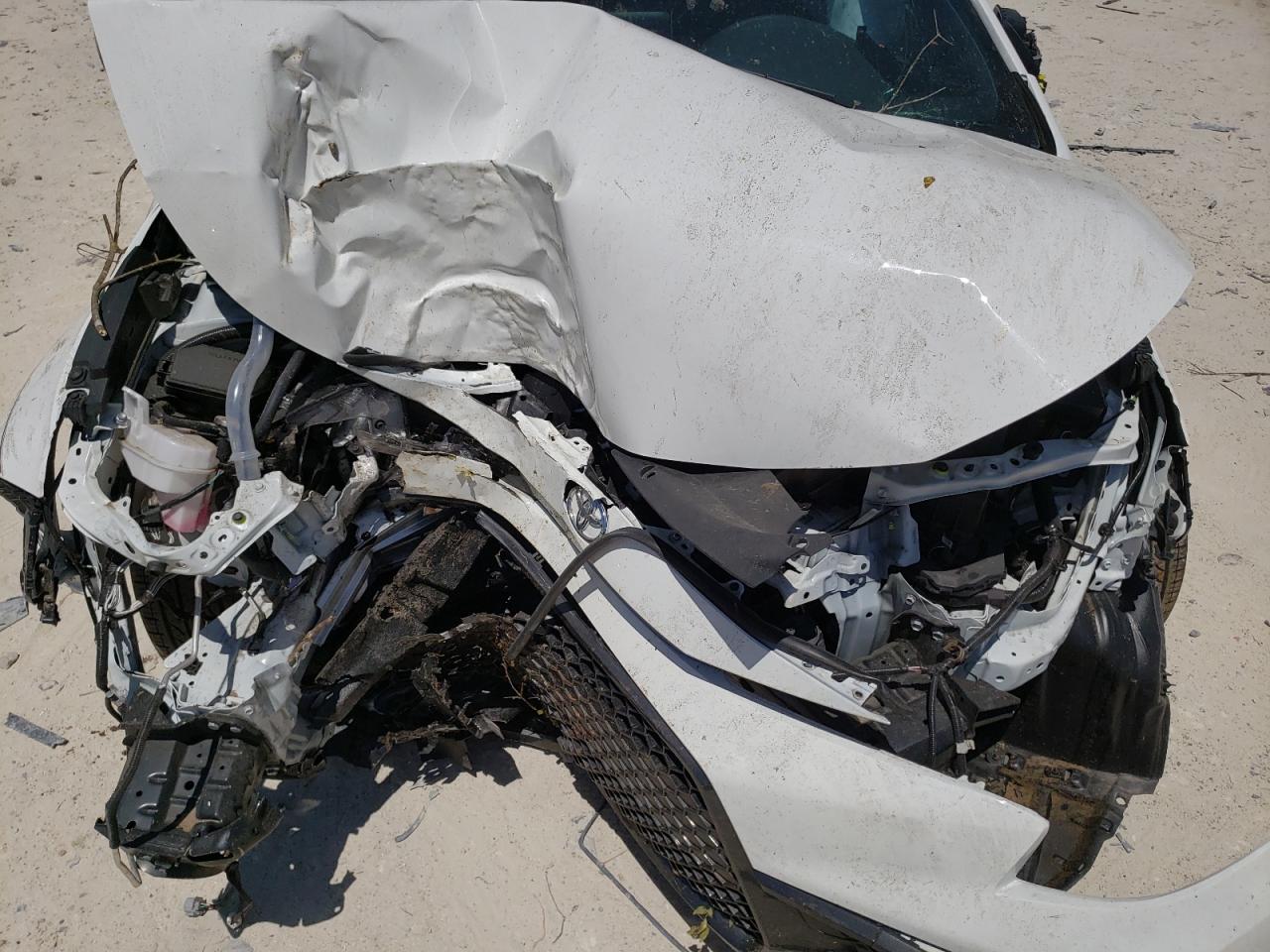 Photo 7 from auction – 2021 TOYOTA COROLLA SE with VIN JTDM4MCE2MJ058180