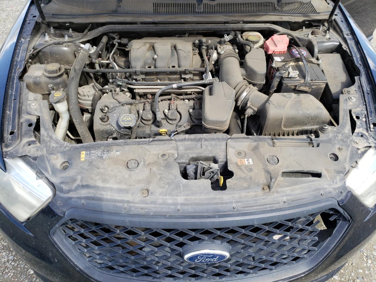 Photo 7 from auction – 2015 FORD TAURUS POL with VIN 1FAHP2MK9FG162270