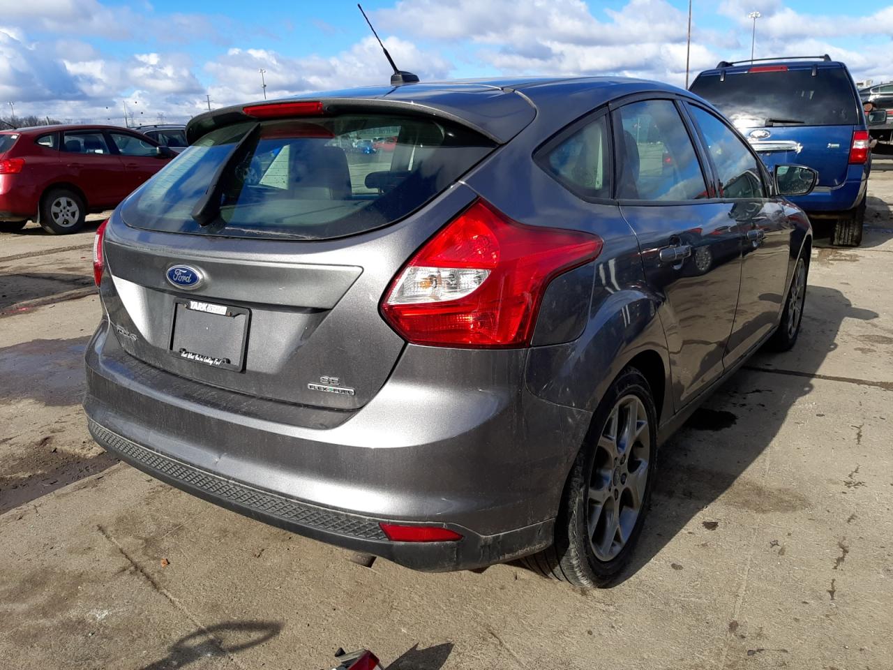 Foto 4 de la subasta – 2014 FORD FOCUS SE con VIN 1FADP3K23EL419016
