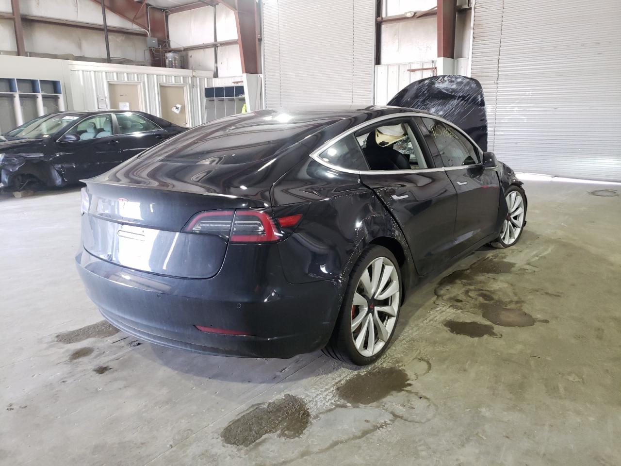 Photo 4 from auction – 2018 TESLA MODEL 3 with VIN 5YJ3E1EB0JF149249