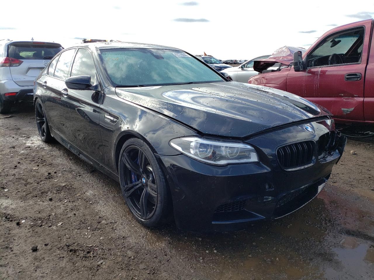 BMW M5 2014 with VIN WBSFV9C52ED593344 - Photo from auction