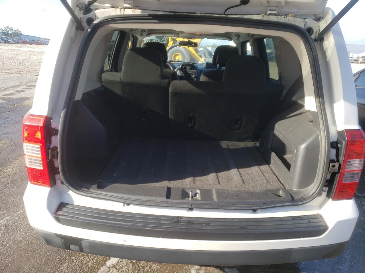 Photo 9 from auction – 2012 JEEP PATRIOT LA with VIN 1C4NJPFA6CD704552