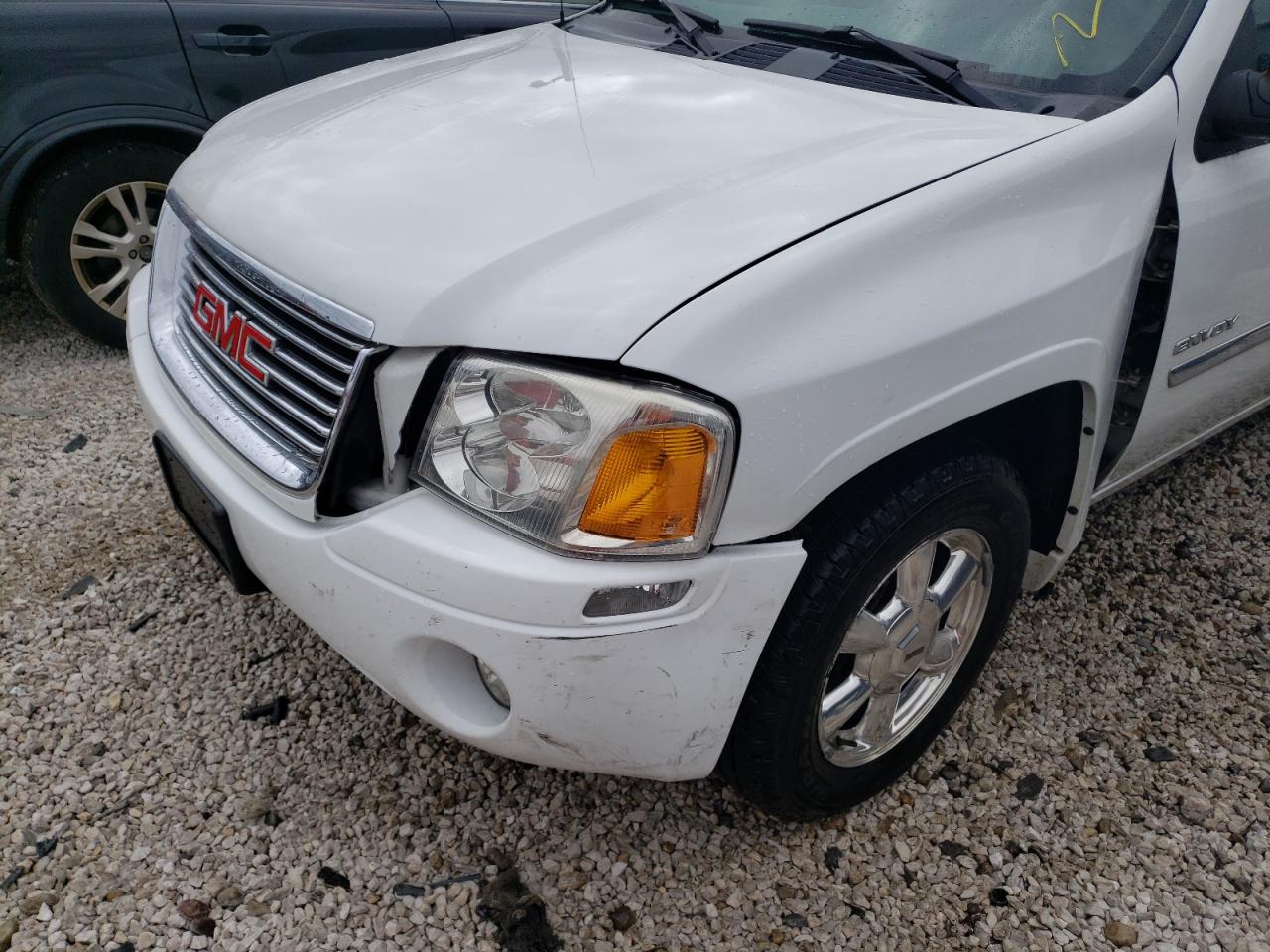 Photo 9 from auction – 2006 GMC ENVOY with VIN 1GKDT13S662187631