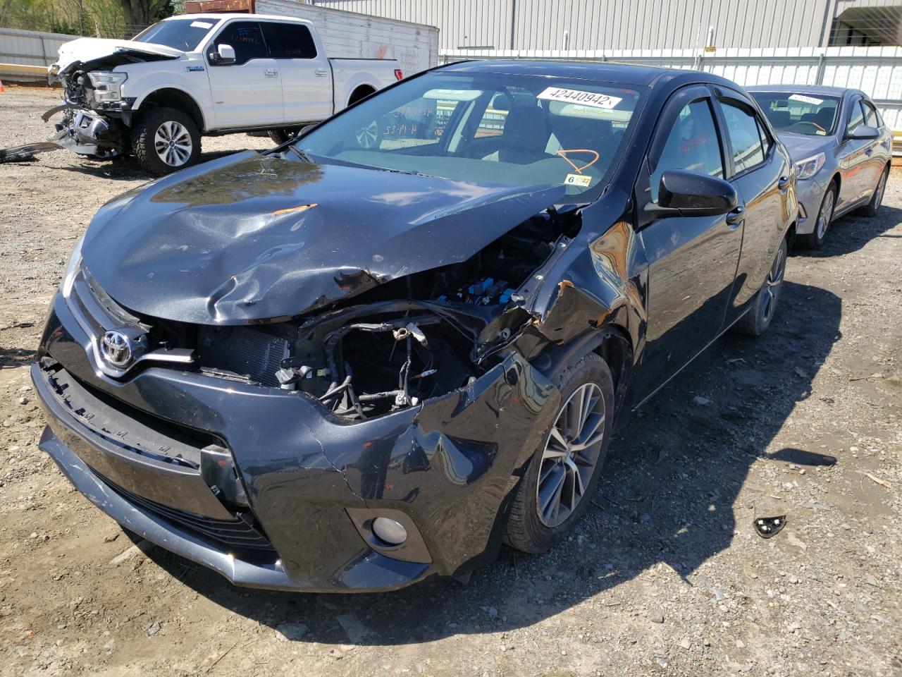 Photo 2 from auction – 2016 TOYOTA COROLLA L with VIN 5YFBURHE7GP428830