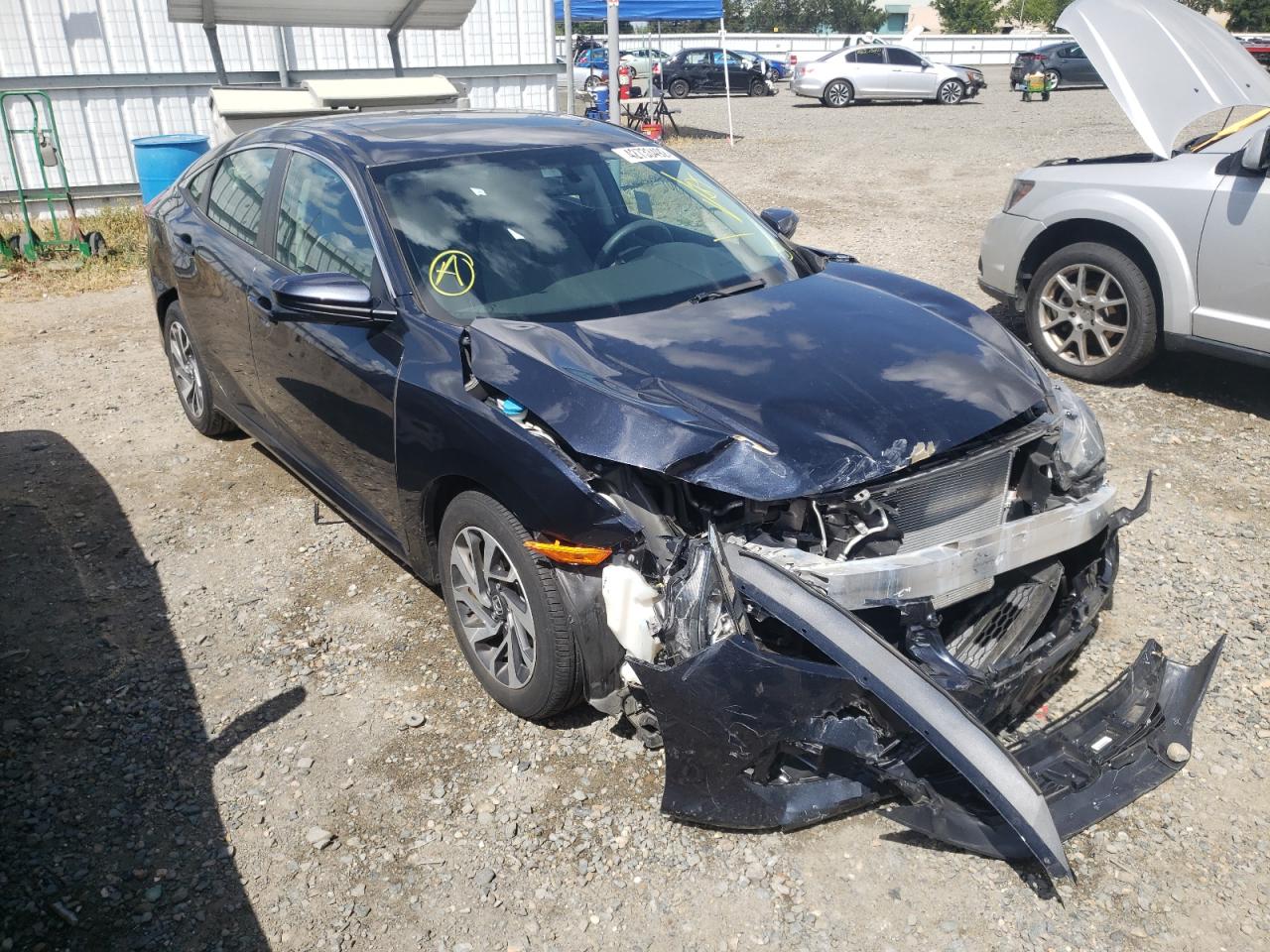 HONDA CIVIC EX 2016 with VIN 19XFC2F77GE225678 - Photo from auction