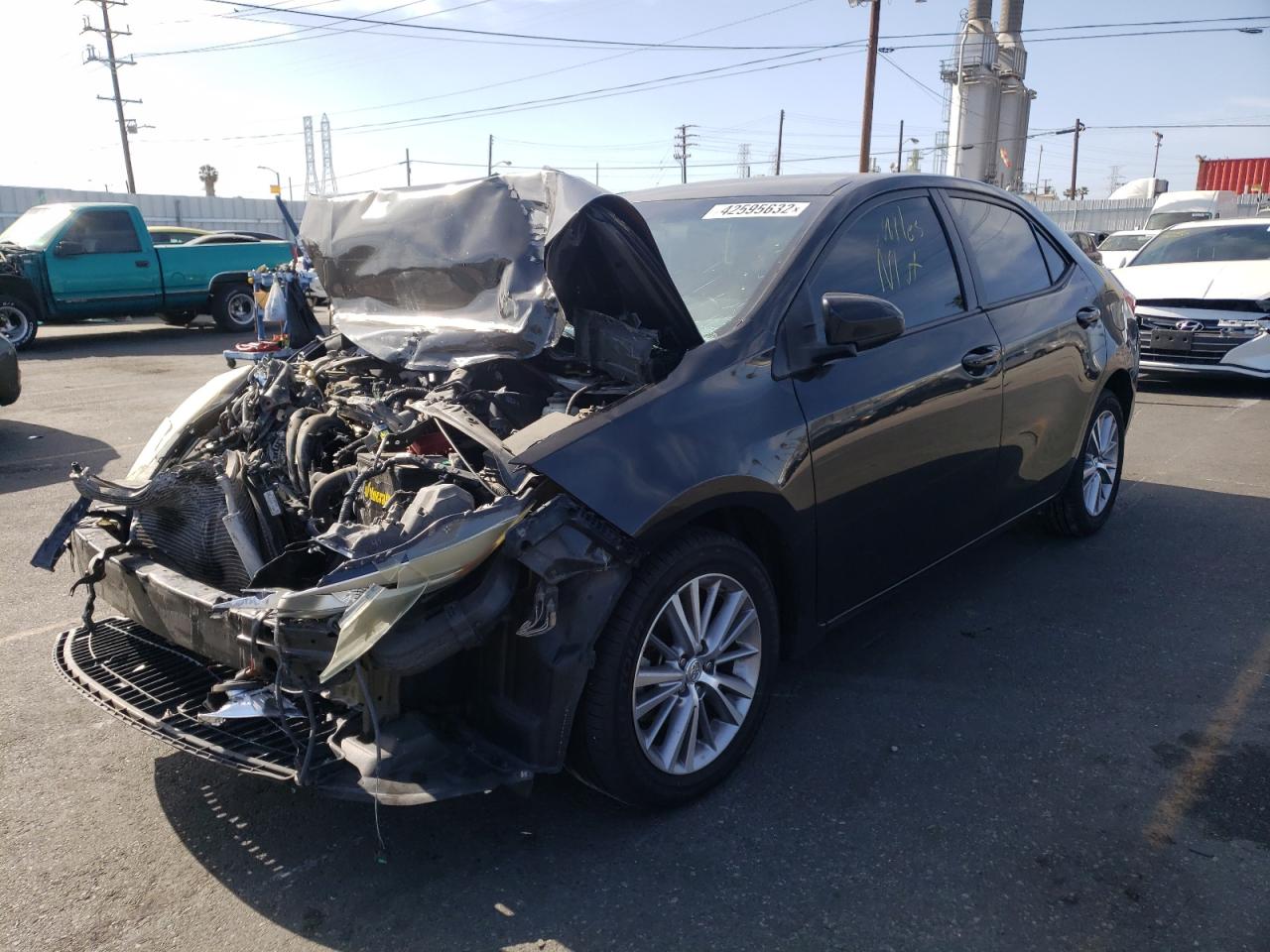Photo 2 from auction – 2015 TOYOTA COROLLA L with VIN 5YFBURHE5FP272091