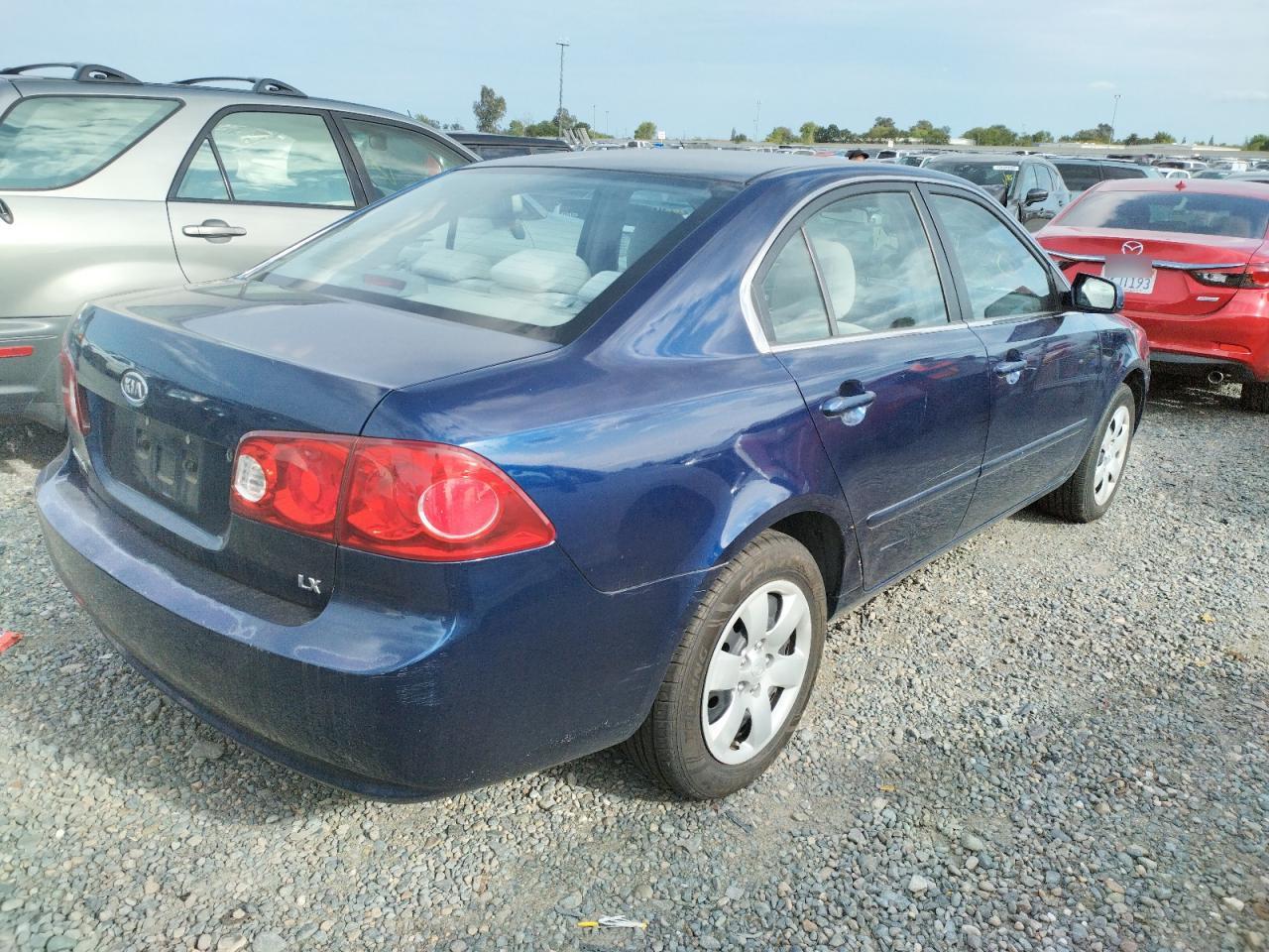 Photo 9 from auction – 2007 KIA OPTIMA LX with VIN KNAGE123275089075