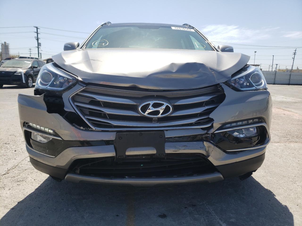 Photo 9 from auction – 2017 HYUNDAI SANTA FE S with VIN 5NMZU3LBXHH032427