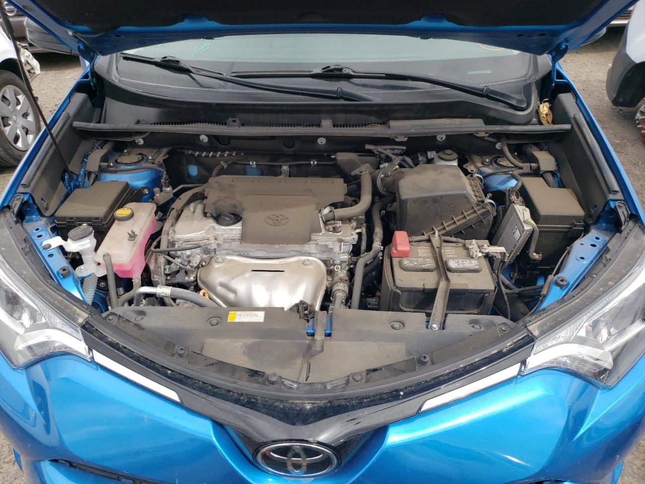 Photo 7 from auction – 2018 TOYOTA RAV4 LE with VIN 2T3ZFREV6JW506072