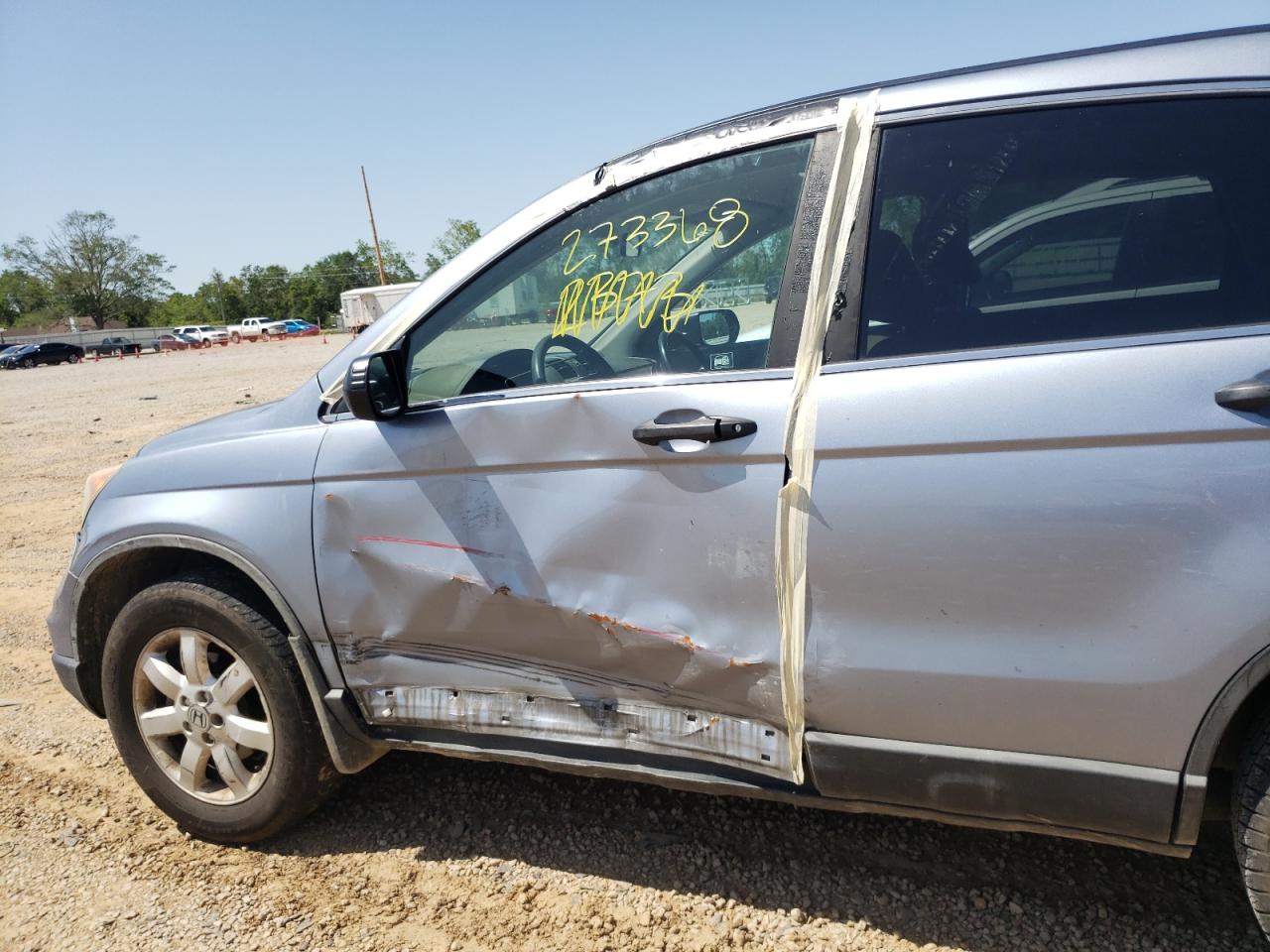 Photo 9 from auction – 2011 HONDA CR-V SE with VIN 5J6RE3H40BL039863