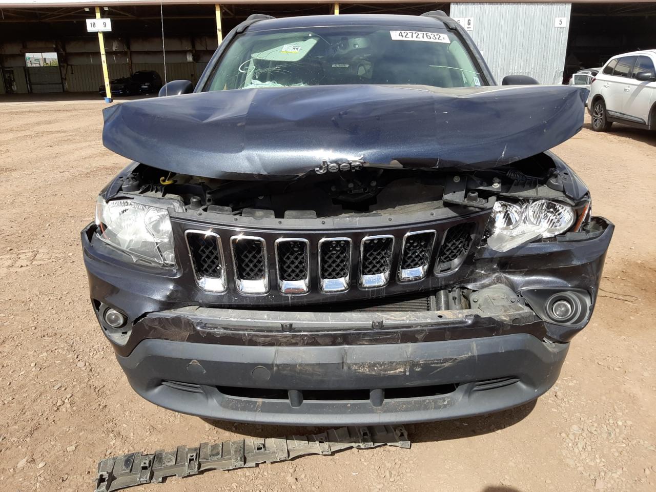 Photo 9 from auction – 2014 JEEP COMPASS SP with VIN 1C4NJCBB6ED905569