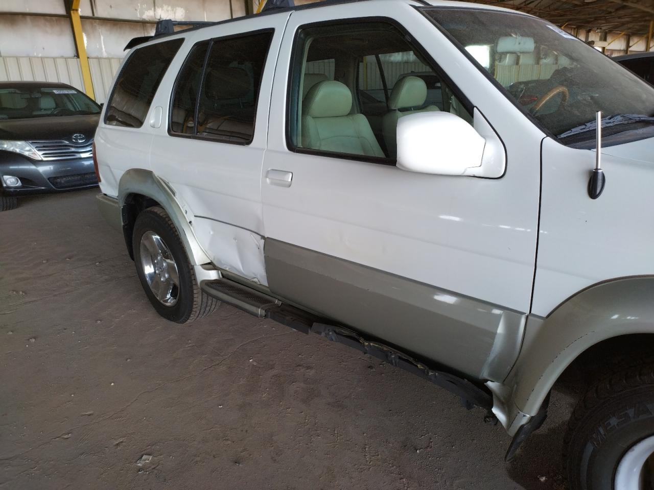 Photo 9 from auction – 2001 INFINITI QX4 with VIN JNRDR09X31W201591