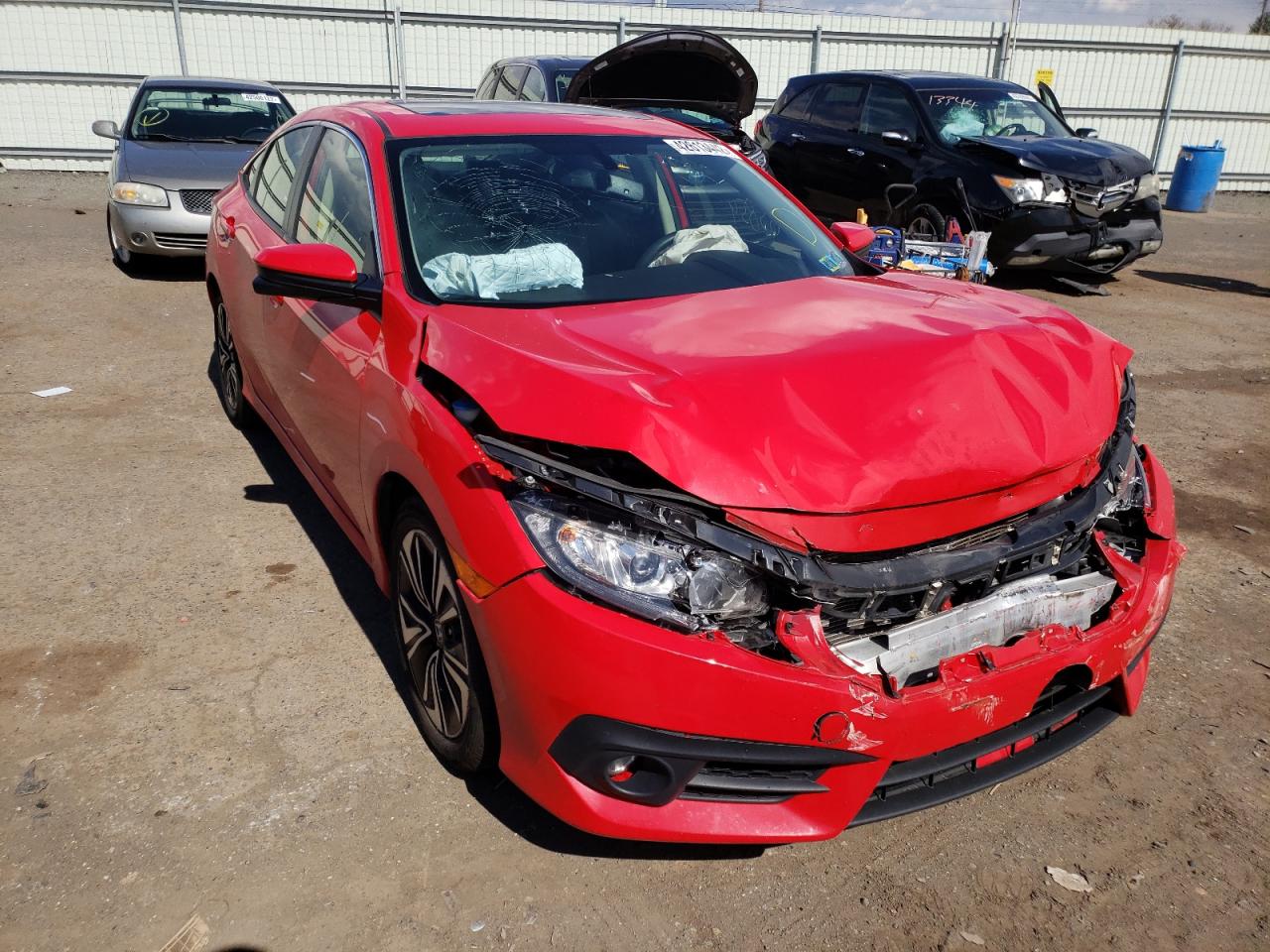 HONDA CIVIC EXL 2018 with VIN JHMFC1F75JX033398 - Photo from auction