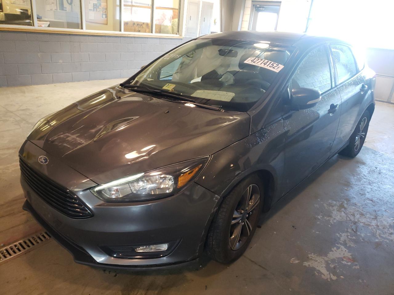 Photo 2 from auction – 2016 FORD FOCUS SE with VIN 1FADP3KE6GL211192
