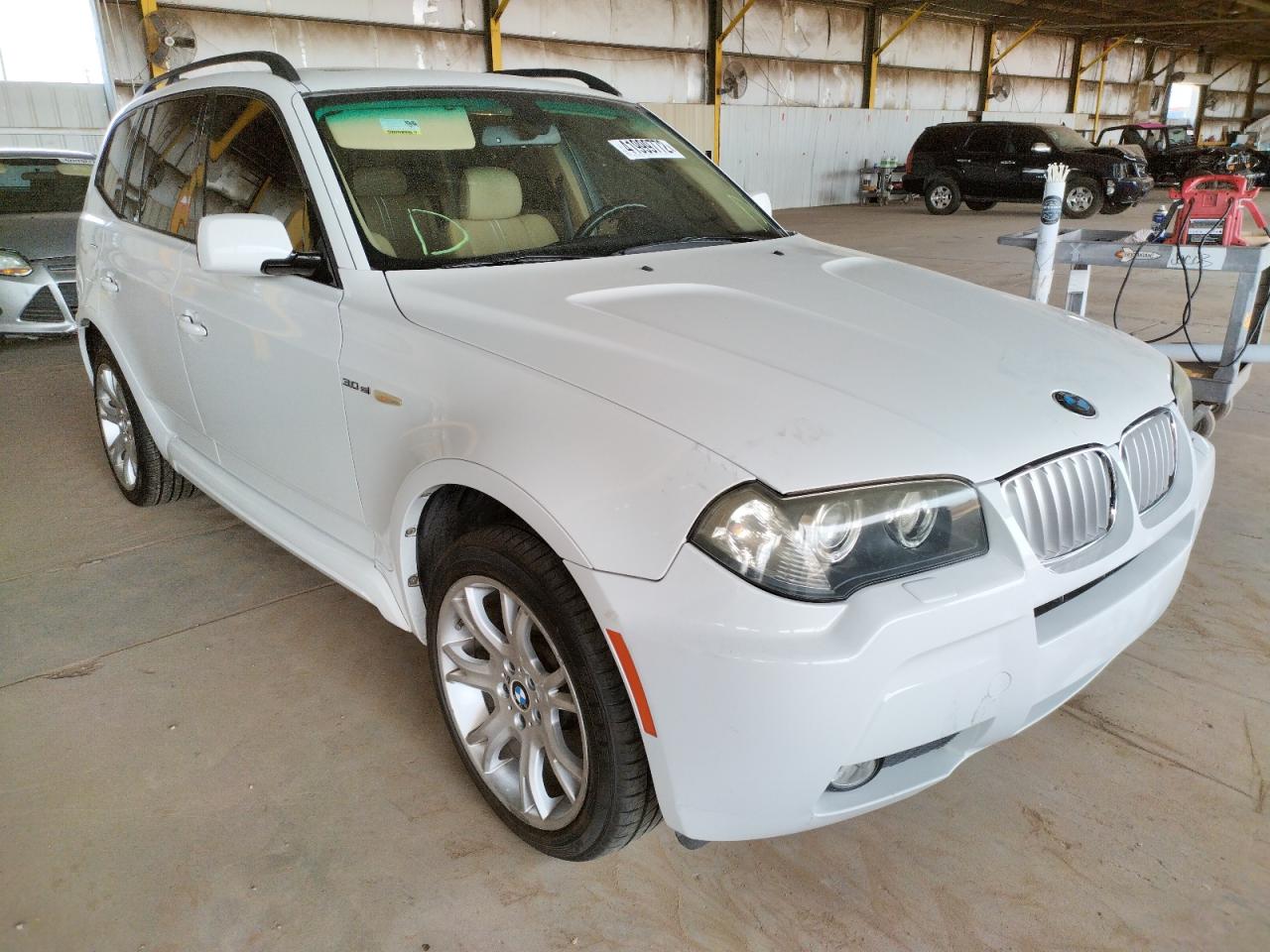 BMW X3 2007 with VIN WBXPC93467WF00217 - Photo from auction
