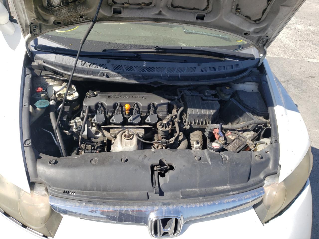 Photo 7 from auction – 2006 HONDA CIVIC with VIN JHMFA16516S006272