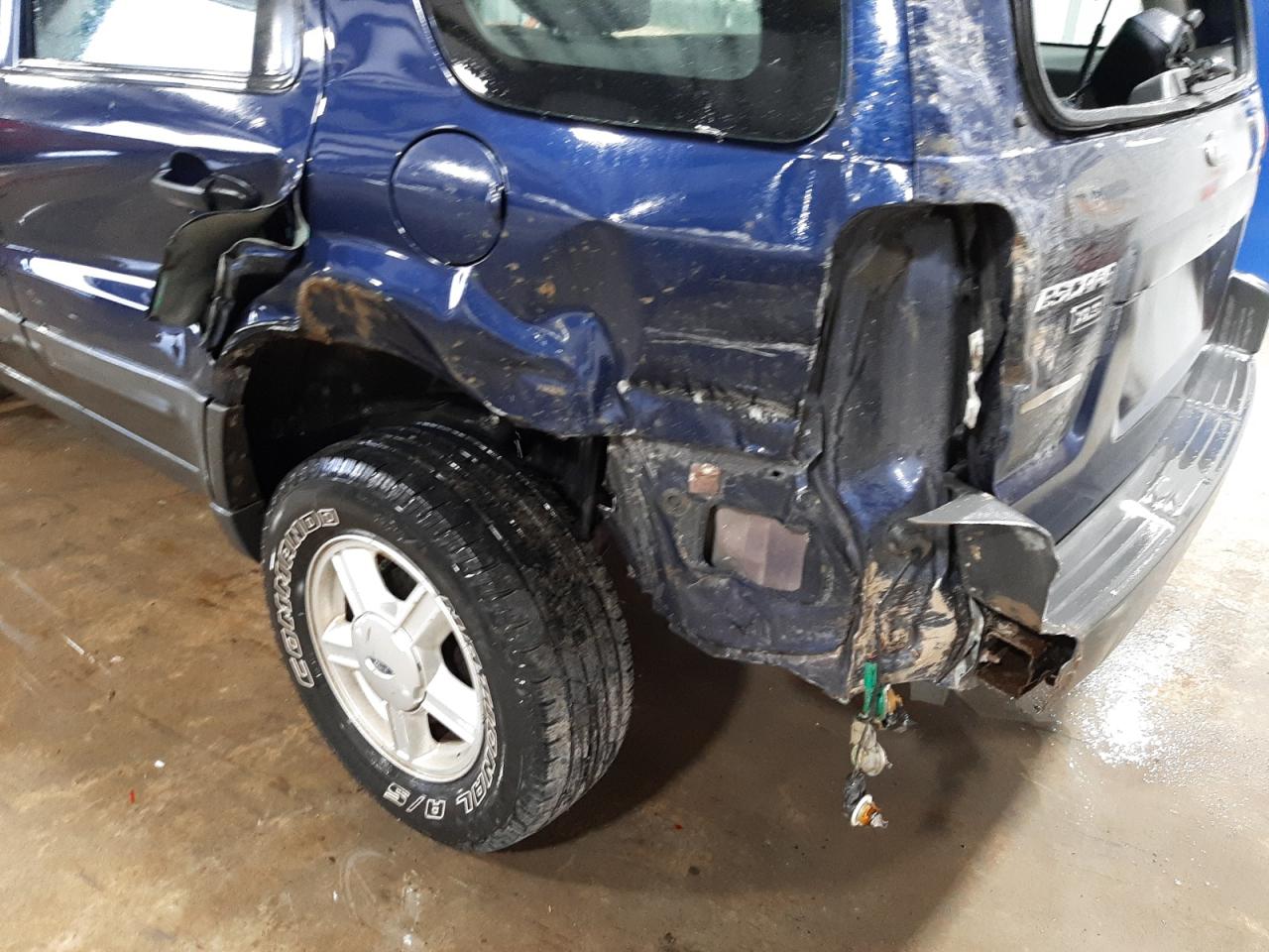 Photo 9 from auction – 2003 FORD ESCAPE with VIN 1FMYU02133KA05016
