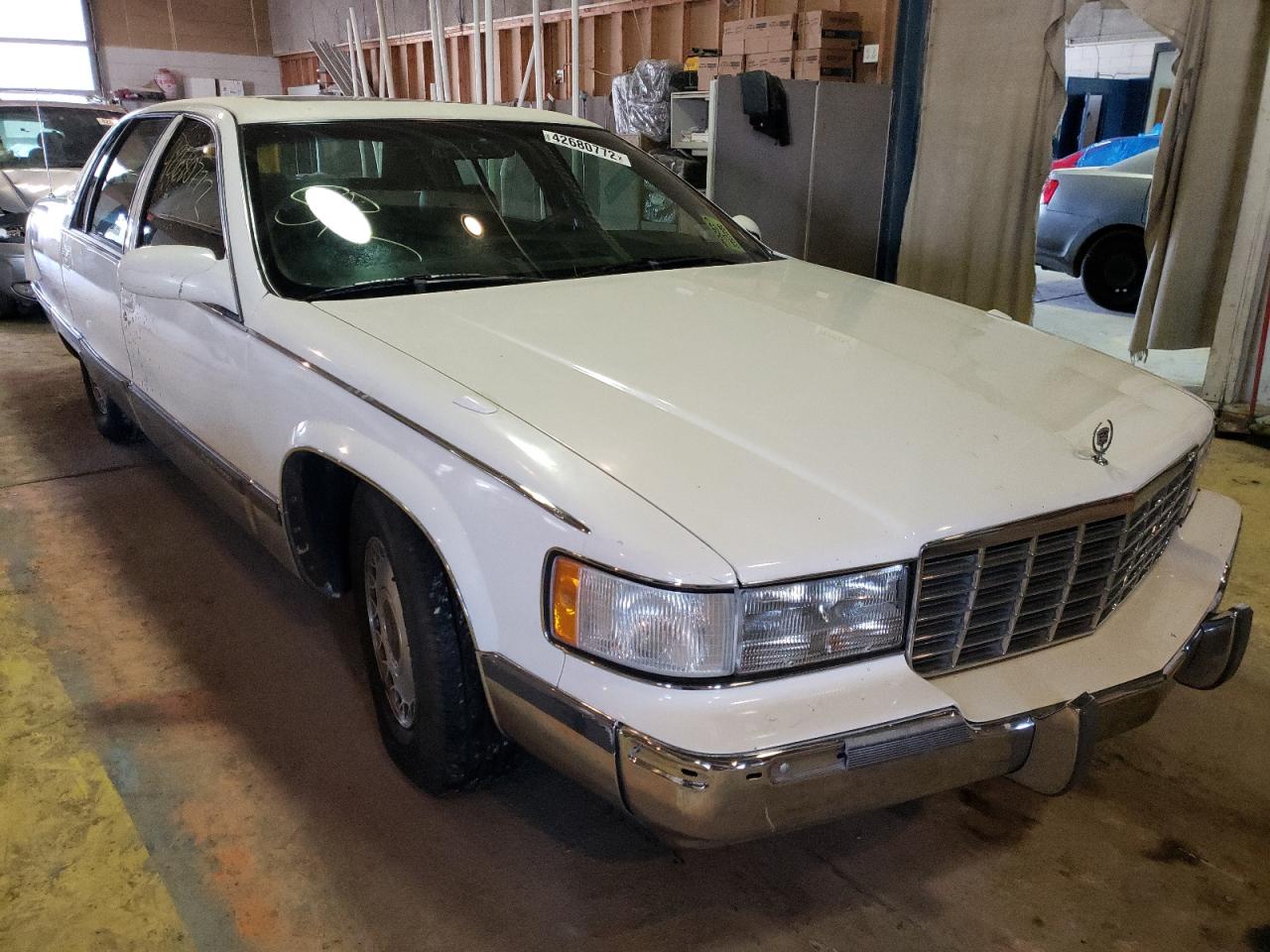 CADILLAC FLEETWOOD 1996 with VIN 1G6DW52P7TR705243 - Photo from auction