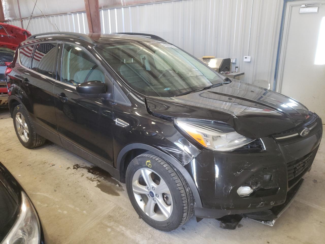 FORD ESCAPE SE 2015 with VIN 1FMCU9GXXFUB01245 - Photo from auction