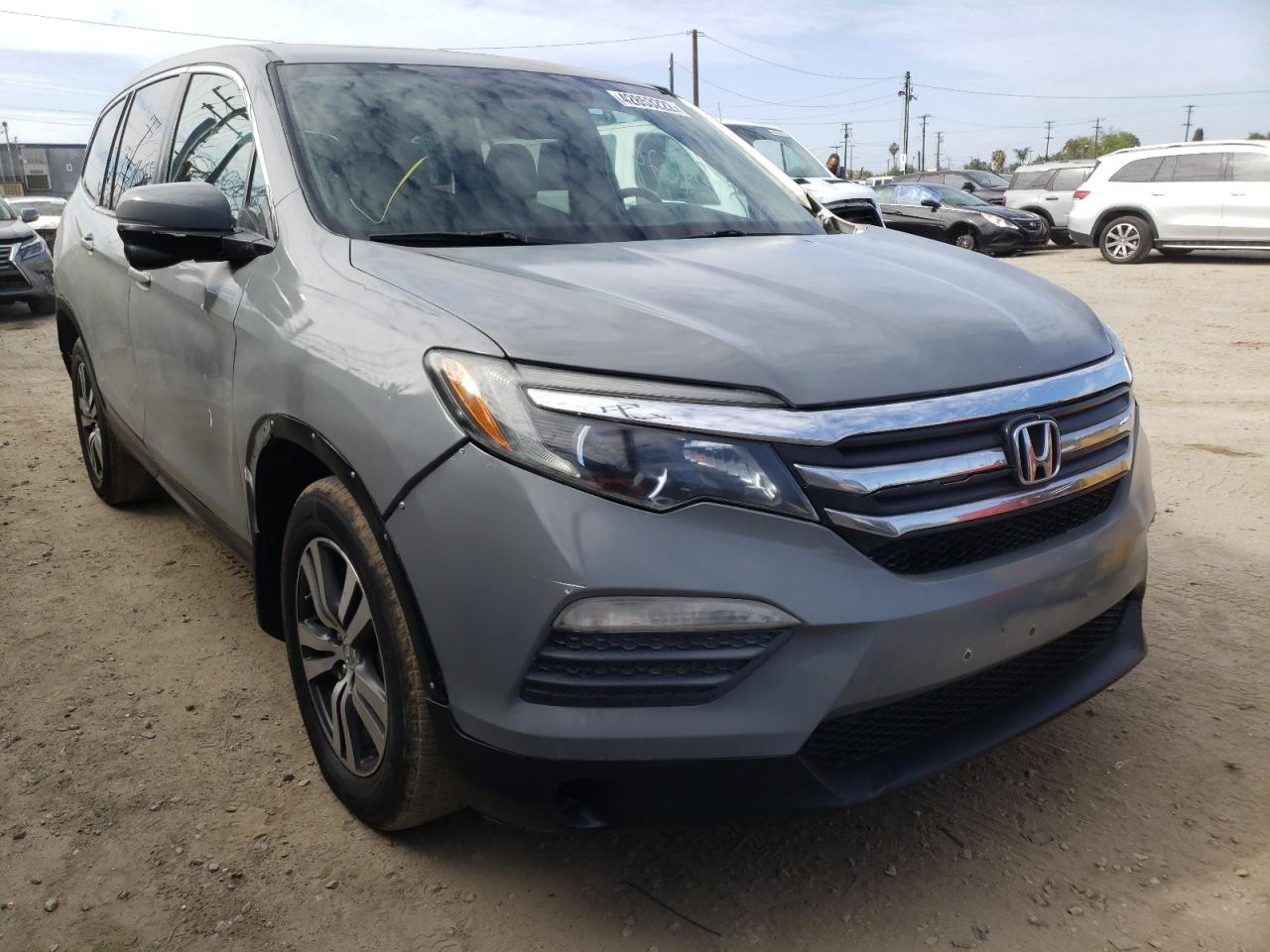 HONDA PILOT EXL 2016 with VIN 5FNYF5H5XGB003921 - Photo from auction