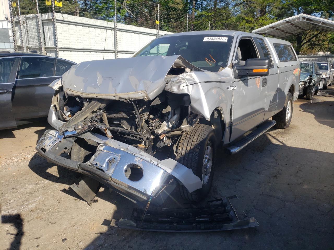 Photo 2 from auction – 2011 FORD F150 SUPER with VIN 1FTEX1CM9BFA48411