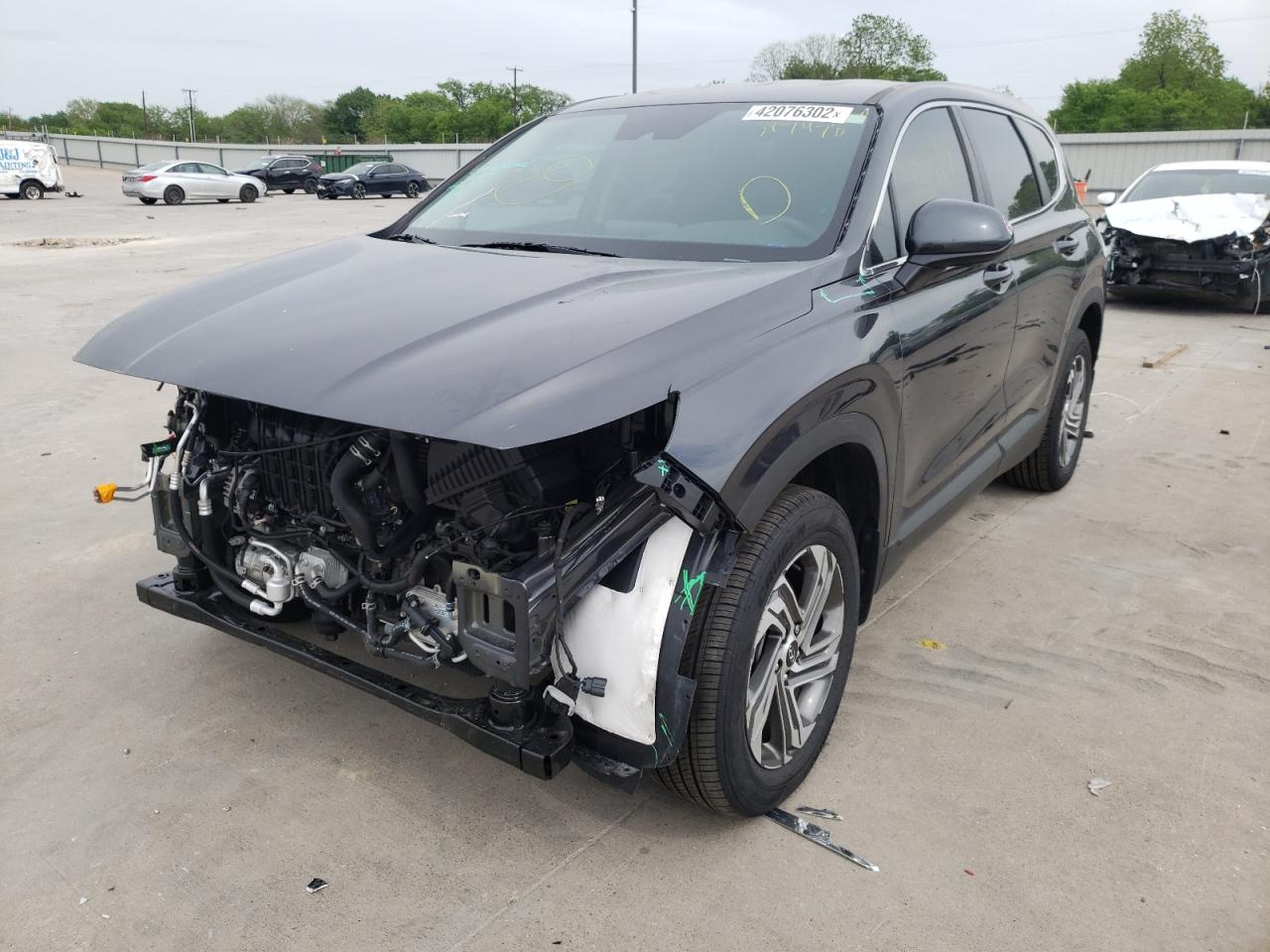 Photo 2 from auction – 2022 HYUNDAI SANTA FE S with VIN 5NMS14AJ0NH397978