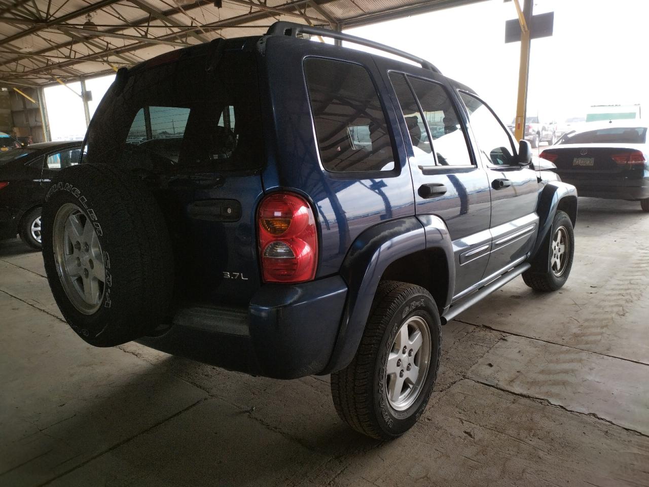 Photo 4 from auction – 2002 JEEP LIBERTY LI with VIN 1J4GL58K52W300832