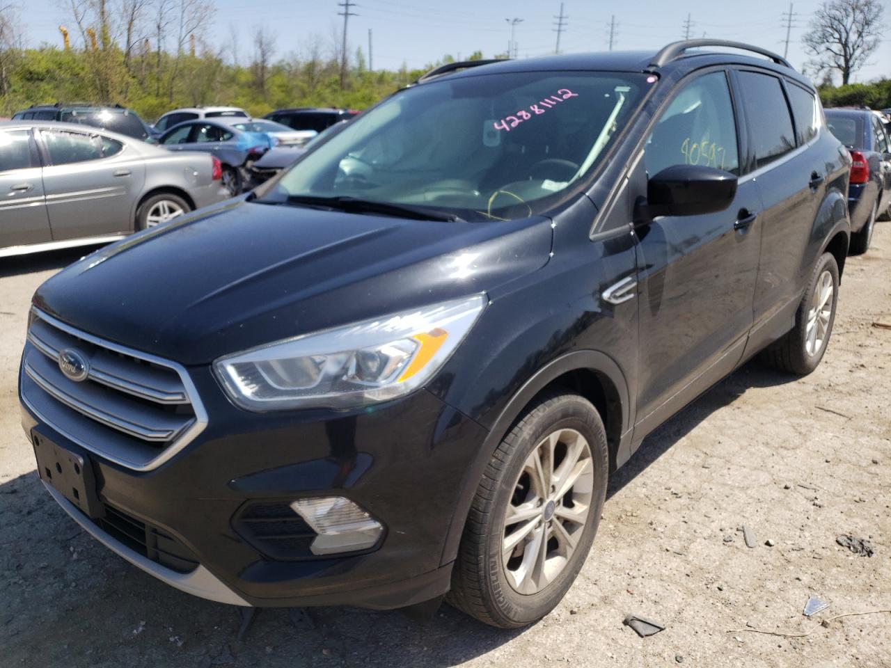 Photo 2 from auction – 2017 FORD ESCAPE SE with VIN 1FMCU9GDXHUB07068