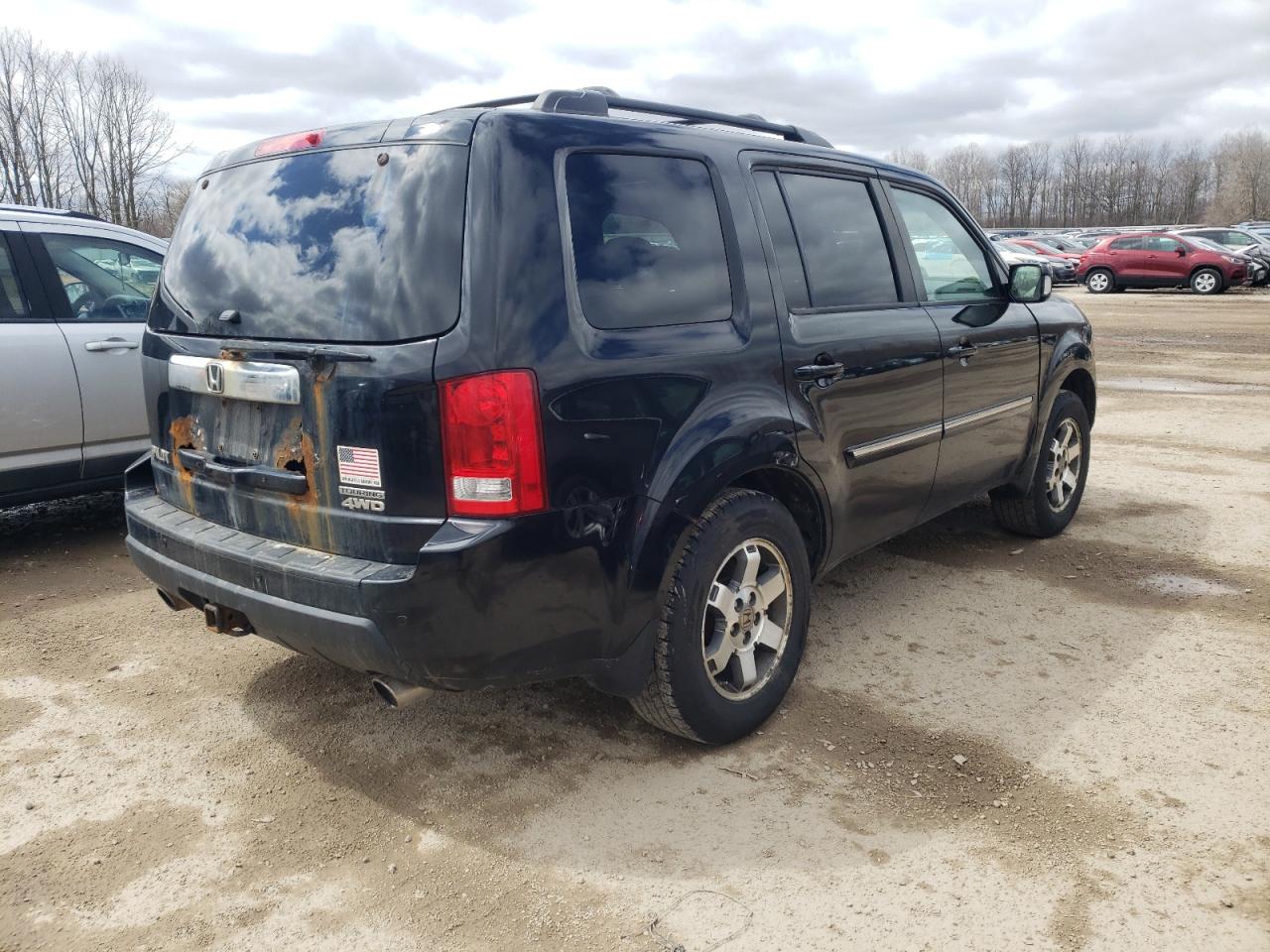 Photo 4 from auction – 2009 HONDA PILOT TOUR with VIN 5FNYF48999B032536