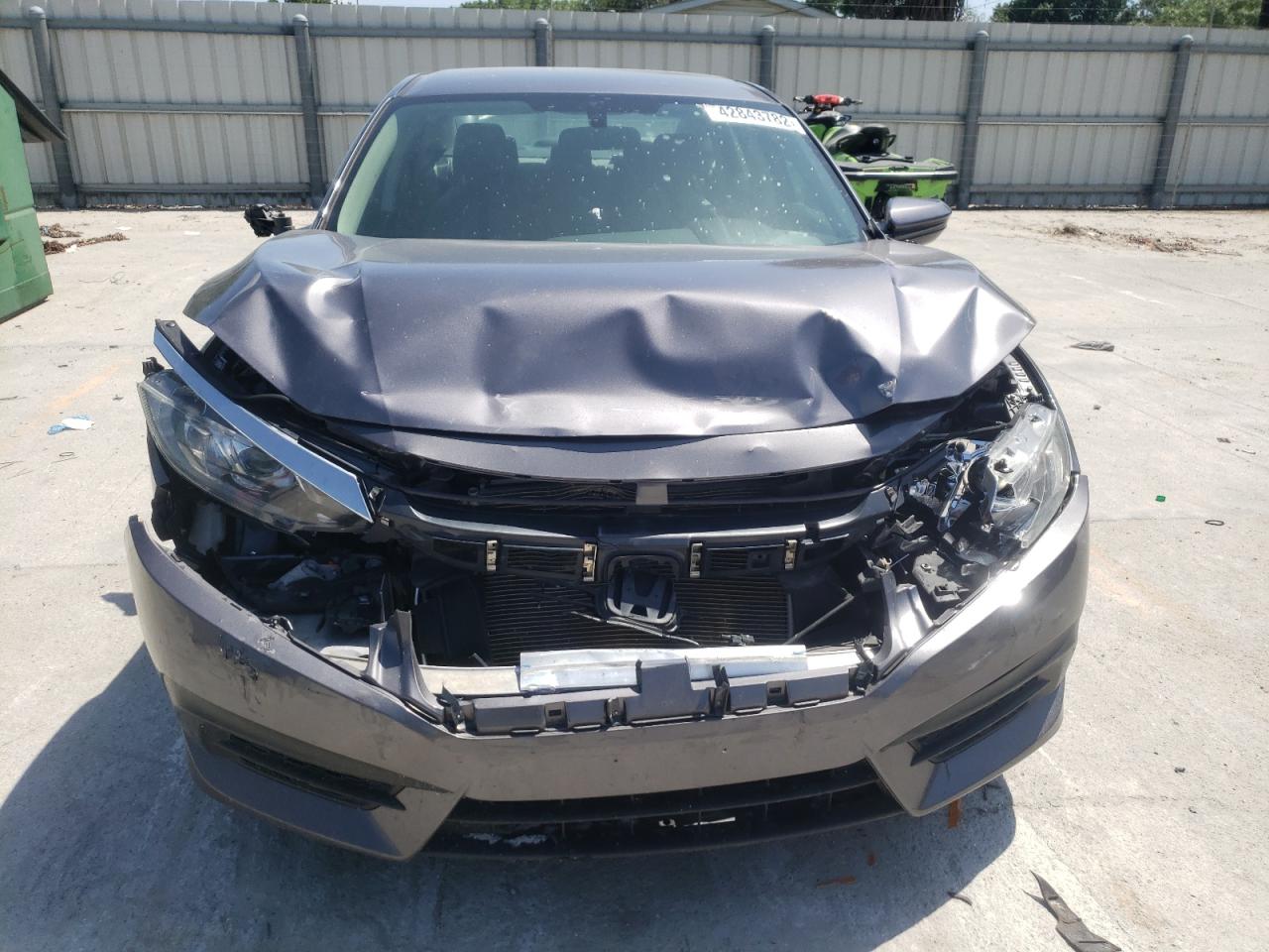 Photo 9 from auction – 2017 HONDA CIVIC LX with VIN 19XFC2F55HE074341