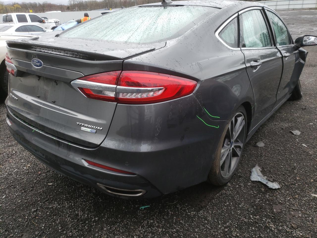 Photo 4 from auction – 2019 FORD FUSION TIT with VIN 3FA6P0D91KR240360
