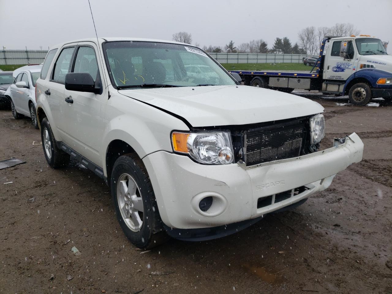 FORD ESCAPE XLS 2011 with VIN 1FMCU0C78BKA99244 - Photo from auction