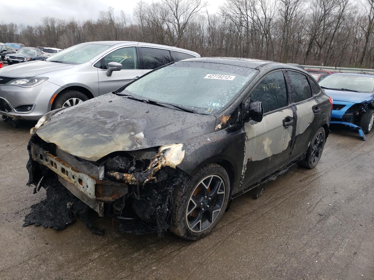 Photo 2 from auction – 2012 FORD FOCUS SE with VIN 1FAHP3F25CL167181