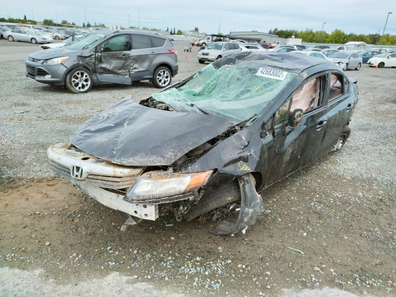 Photo 2 from auction – 2012 HONDA CIVIC LX with VIN 2HGFB2F56CH609940