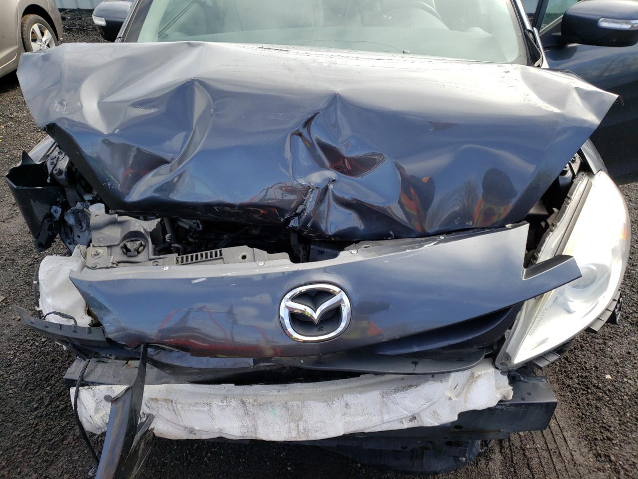 Photo 7 from auction – 2014 MAZDA 5 GRAND TO with VIN JM1CW2DL6E0168227